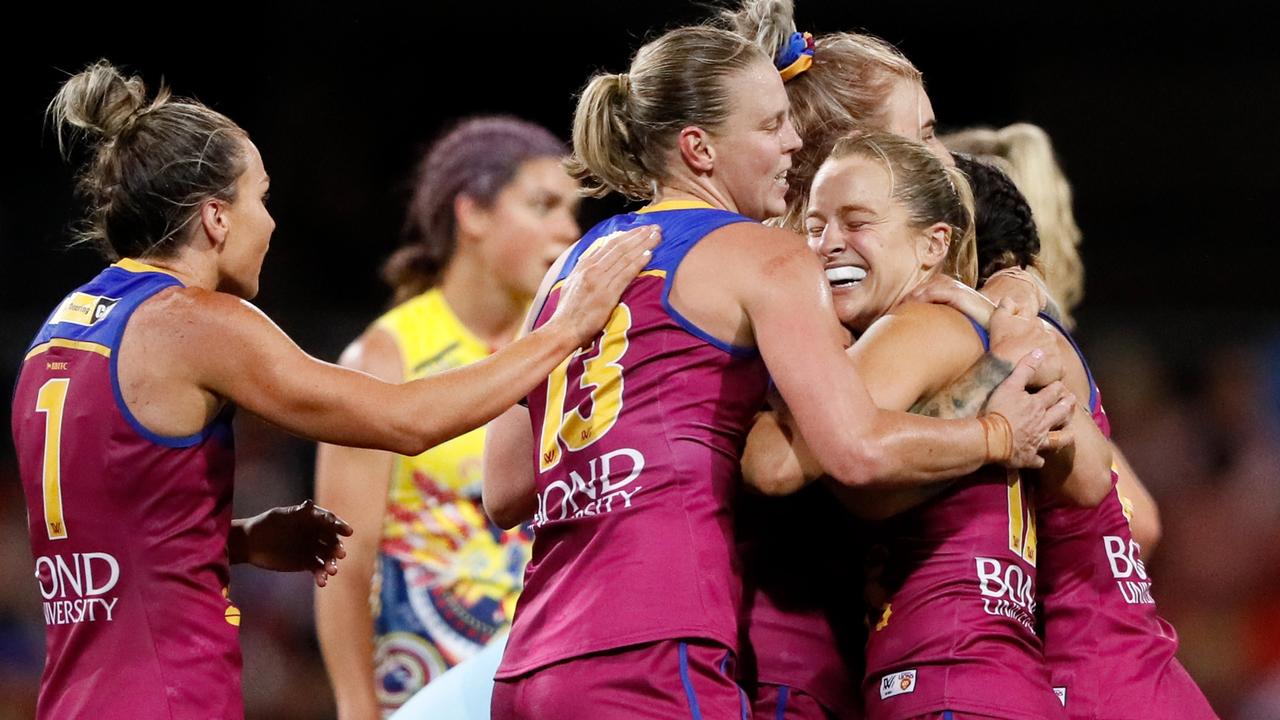 Brisbane Lions players celebrate after the final siren. Picture: Dylan Burns/AFL Photos via Getty Images