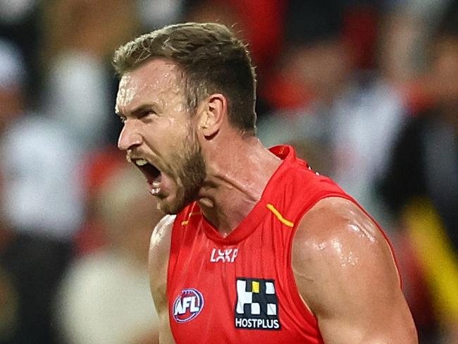 GOLD COAST, AUSTRALIA - JUNE 29: Sam Day of the Suns celebrates a goal during the round 16 AFL match between Gold Coast Suns and Collingwood Magpies at People First Stadium, on June 29, 2024, in Gold Coast, Australia. (Photo by Chris Hyde/Getty Images)