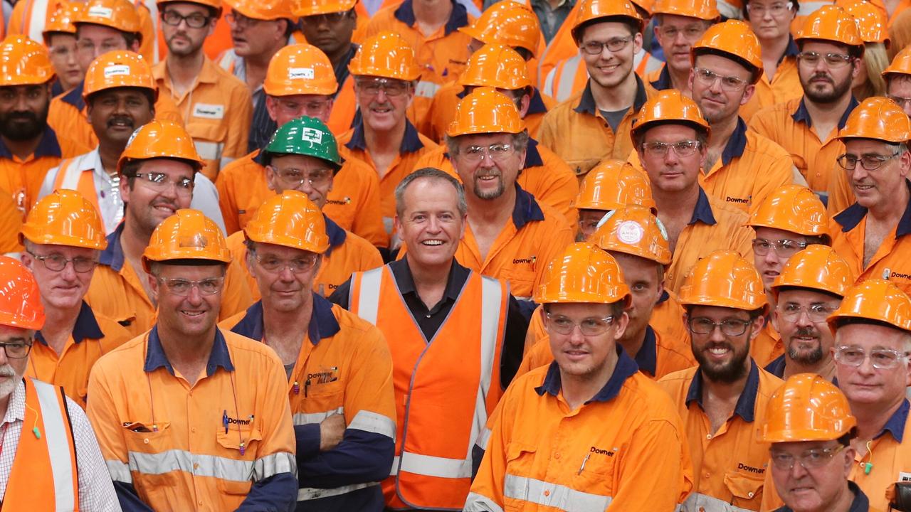 Former Opposition Leader Bill Shorten put on some high visibility gear during a tour of a railway workshop in Maryborough, Queensland, during campaigning for the last federal election. Picture: Lyndon Mechielsen, The Australian