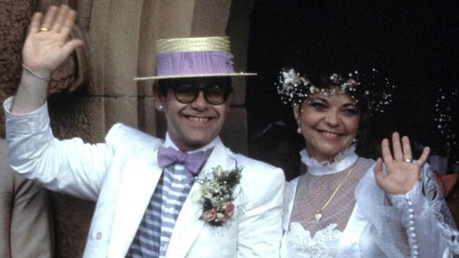 Elton John and Renata Blauel on their wedding day in Sydney in 1984. Their union didn’t last – but maybe that’s cause because Elton hadn’t written Can You Feel The Love Tonight at that time. He later remarried David Furnish. Picture: Getty Images