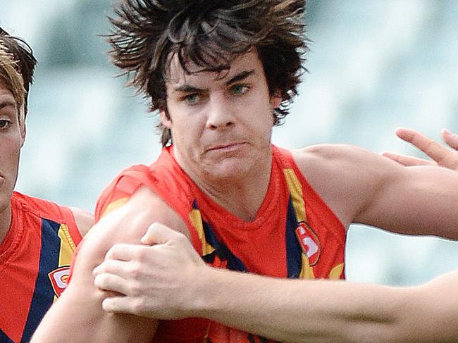 17/6/17 SA v Allies State U18 football match at Adelaide Oval. Darcy Fogarty (SA) barges through a pack. Picture Roger Wyman