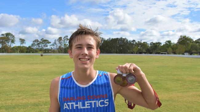 WEIGHED DOWN: Nick Denny had an impressive haul at the Queensland Athletics Carnival taking home two golds and a silver.