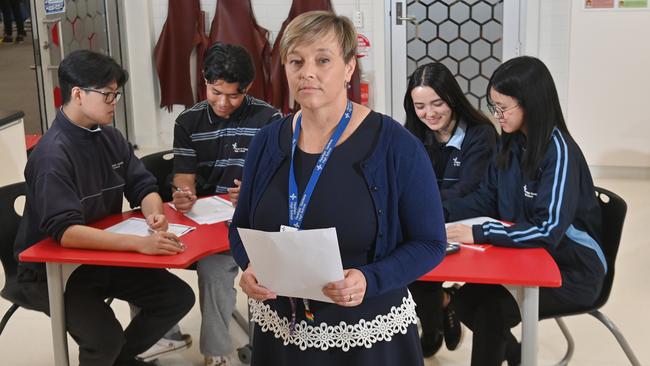 Principal of Parafield Gardens High School, Kirsty Amos. Yr 11 students Mikey Kim, Thanakoudom Than, Kristy, Tamanna Mohebi and Lalkross Mawizuali in class. Picture: Keryn Stevens