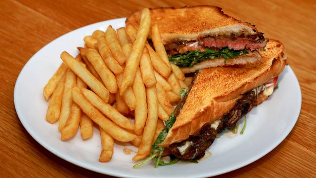 The steak sandwich comes with a serve of fries. Picture: Angelo Velardo