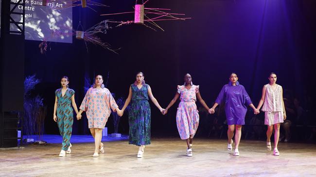 Models wear Shannon Brett & Bana Yirrji Art Centre designs at the Cairns Indigenous Art Fair fashion performance, Woven, held at the Tanks Arts Centre, Edge Hill. Picture: Brendan Radke