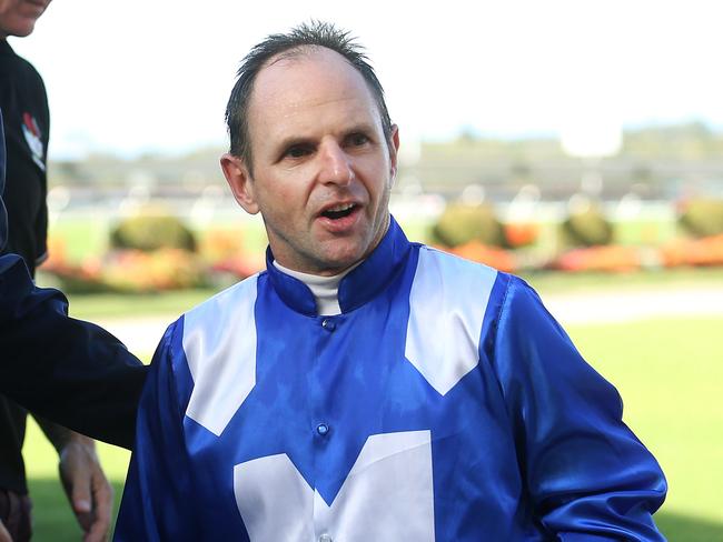 Peter Tighe with Larry Cassidy after "Winx" won Race 5 at the Caloundra Cup Day at Corbould Park Racecourse. Pics Tara Croser.