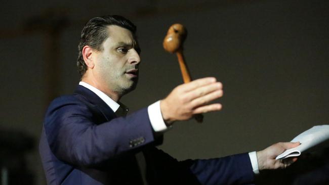 Auctioneer Richard Baini at the Richard Matthews Real Estate agency in Strathfield. Picture: Christian Gilles