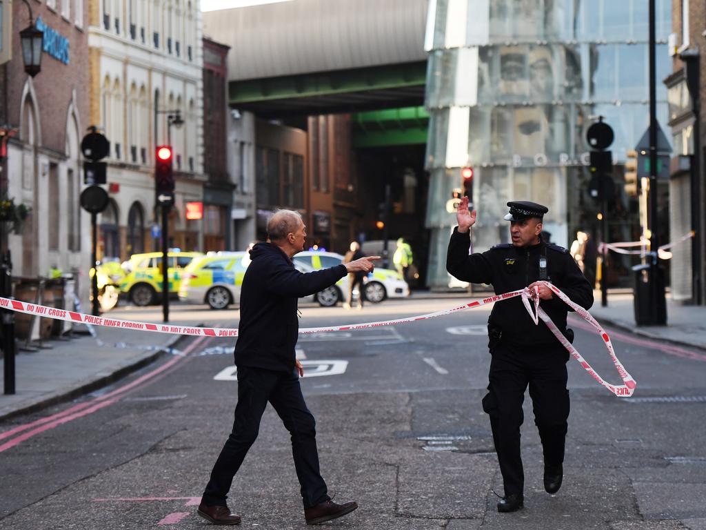 Members of the public are held behind a police cordon near London Bridge: Picture: Chris J Ratcliffe/Getty Images.