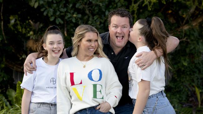 Costello with his wife Sam and daughters (L-R) Charli-Rose, 11, and Matilda, 12 at home in 2021. Picture: Naomi Jellicoe