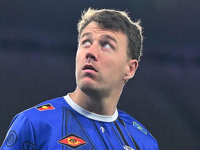 MELBOURNE, AUSTRALIA - MAY 23: Jack Macrae of the Bulldogs warms up ahead of the round 11 AFL match between Western Bulldogs and Sydney Swans at Marvel Stadium, on May 23, 2024, in Melbourne, Australia. (Photo by Morgan Hancock/Getty Images)