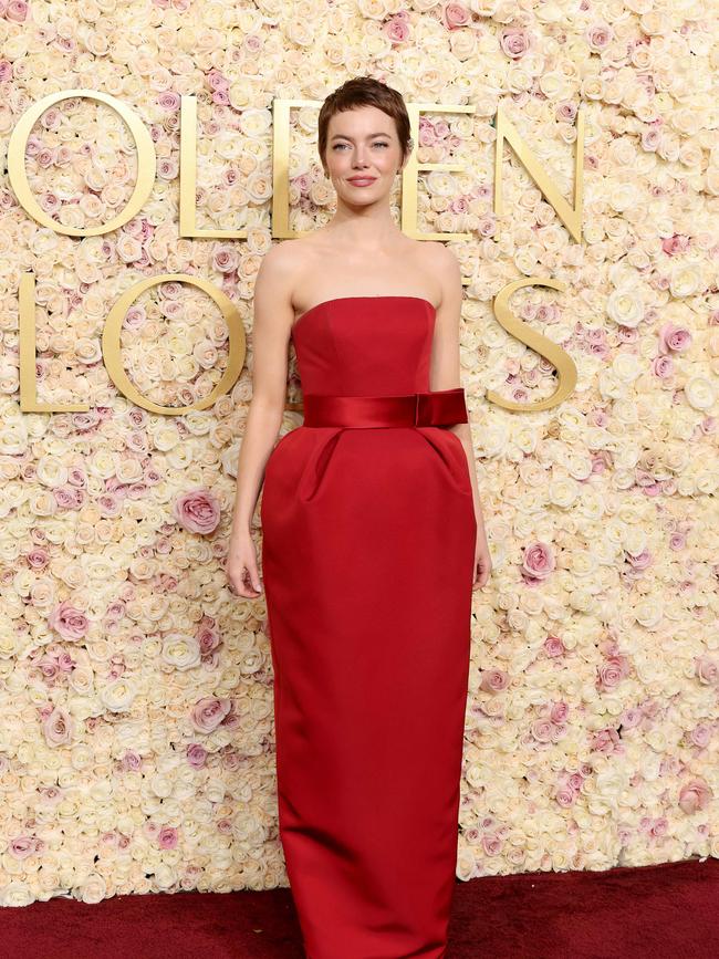 Emma Stone debuts her new look on the red carpet. Getty
