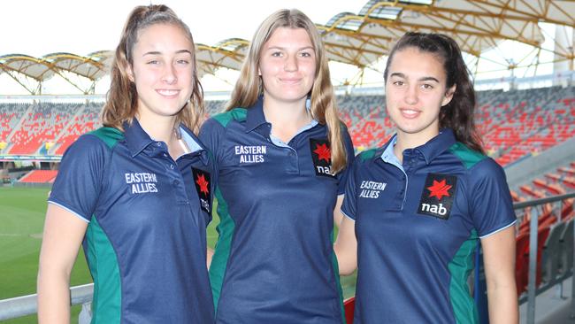 East Coast Eagles players Georgia Garnett, Emily Hurley and Brenna Tarrant representing the Eastern Allies at the AFLW Under-18 Women's Championships on the Gold Coast.