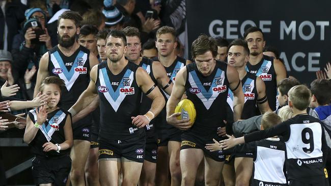 Travis Boak leads Port Adelaide on to the field before its heartbreaking elimination final loss to West Coast. Picture Sarah Reed