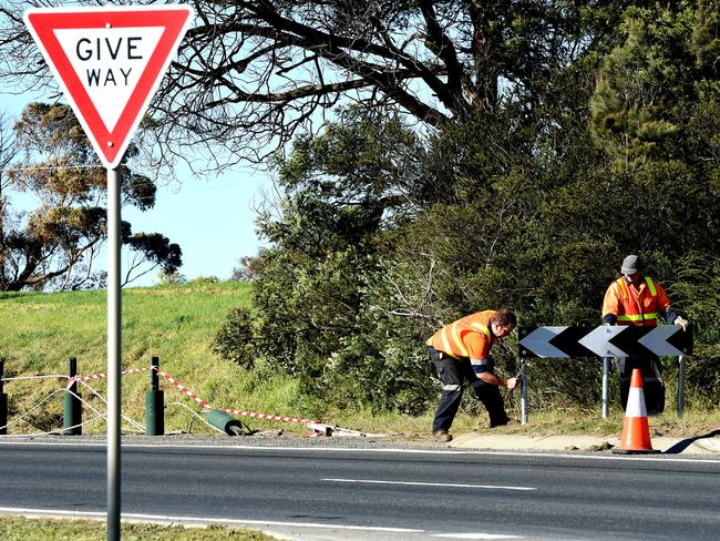 Crews do some repairs near where the crash took place. Picture: Nicole Garmston