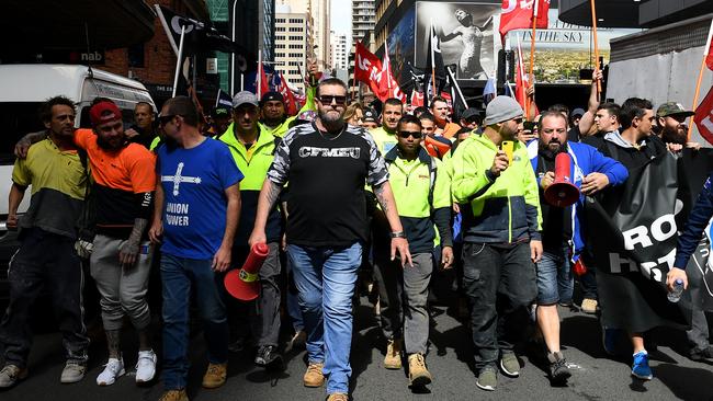 CFMEU State Secretary Darren Greenfield (centre) leads trade and construction workers during a protest march in Sydney in 2018. Picture: AAP Image/Dan Himbrechts