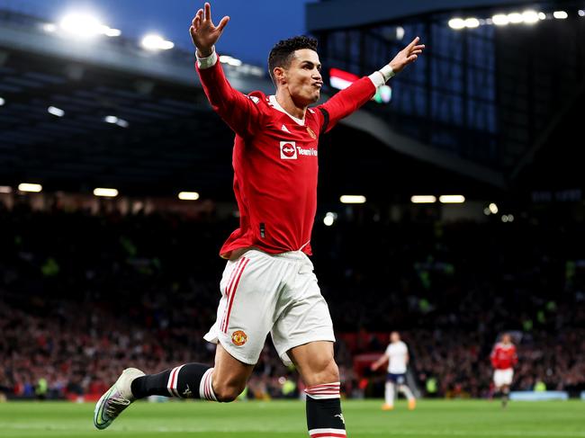 MANCHESTER, ENGLAND - MARCH 12: Cristiano Ronaldo of Manchester United celebrates after scoring their side's second goal during the Premier League match between Manchester United and Tottenham Hotspur at Old Trafford on March 12, 2022 in Manchester, England. (Photo by Naomi Baker/Getty Images) *** BESTPIX ***