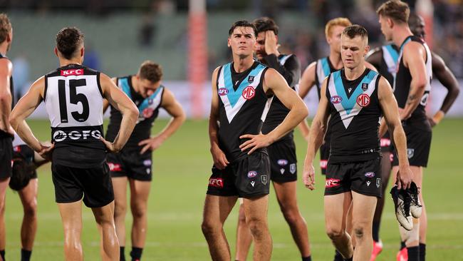 Power players look dejected after Geelong overpowered them in a final-quarter shootout. Picture: Getty Images