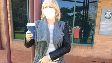 Monica Hughes has chained herself to the Mornington Police Station in protest of the State Government's coronavirus restrictions.