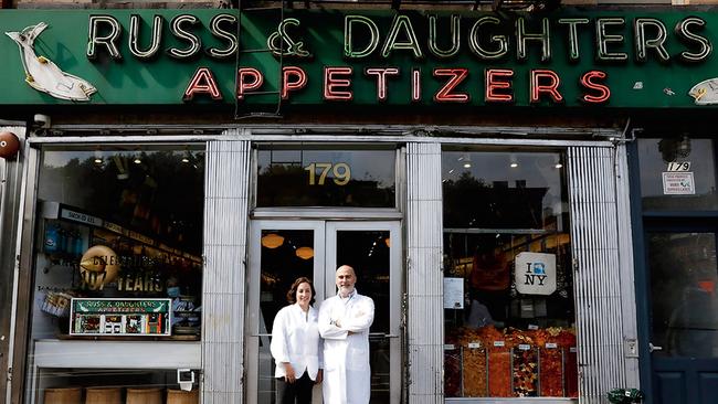 Cousins and co-owners Niki Russ Federman and Josh Russ Tupper outside their cult Jewish deli, Russ &amp; Daughters, on New York’s Lower East Side.