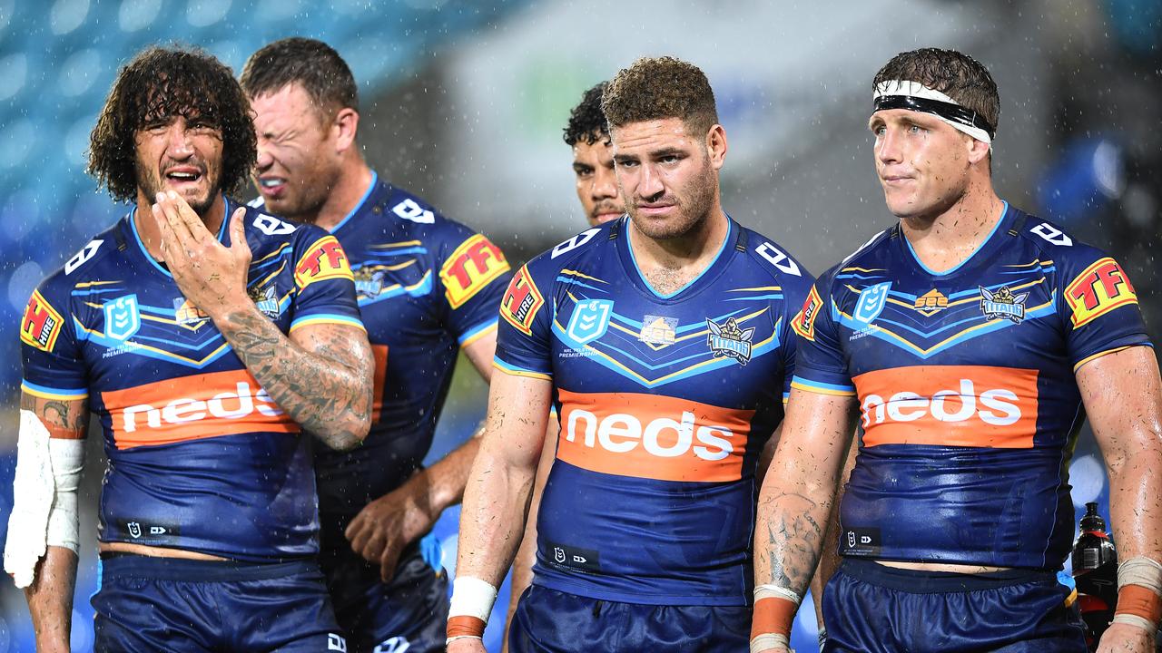 Titans players are dejected following a Raiders try during Round 1 of 2019