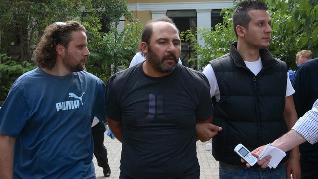 Mokbel in the custody of Greek police.