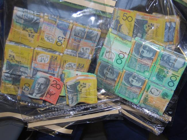 More than $230,000 was allegedly seized from McKinnon’s home in McGraths Hill last month.