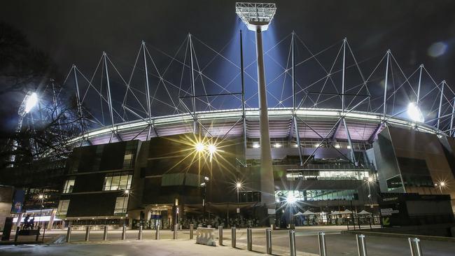 Normally a blockbuster game would see the MCG packed on a Friday night but with no fans allowed in the famous stadium had an eerie silence about it. Picture: Ian Currie