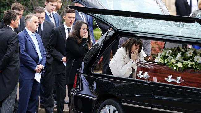 Stuart's mother Kathy Kelly says a goodbye to her son, following the funeral. Picture: Craig Greenhill