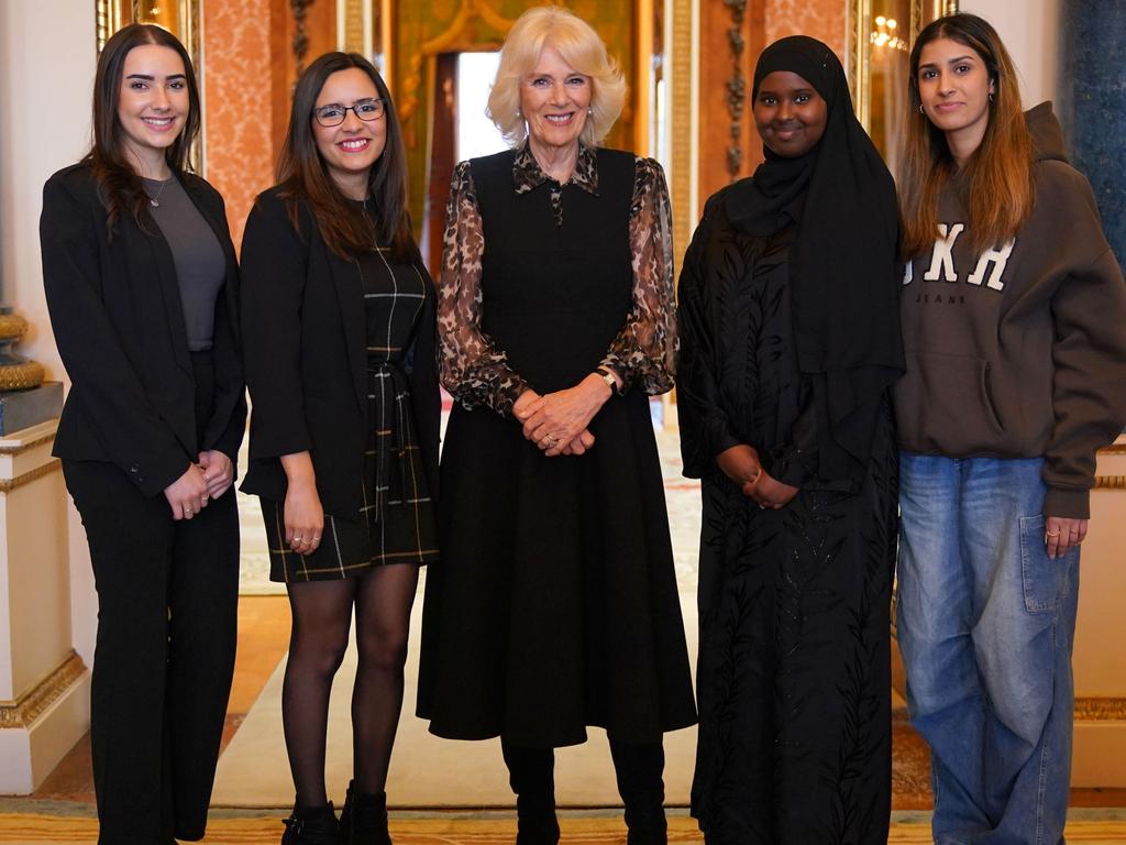 Queen Camilla, Patron of SafeLives poses with young pioneer 'Changemakers' Imi, Maya, Almas, Lybah. Picture: Yui Mok-WPA Pool/Getty Images