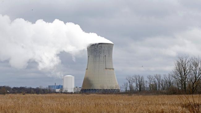 Plumes of steam drift from the cooling tower of FirstEnergy's Davis-Besse Nuclear Power Station in Oak Harbor, Ohio. PHOTO: RON SCHWANE/ASSOCIATED PRESS