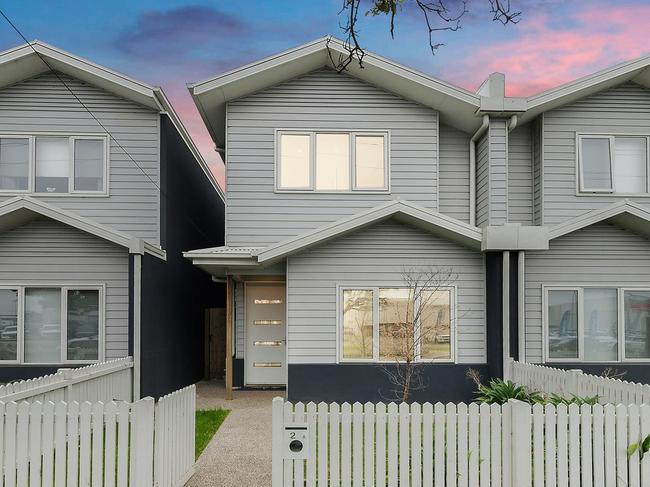 The four-bedroom townhouse at 25a Fyans St, South Geelong, is listed for sale with price hopes from $890,000 to $930,000.