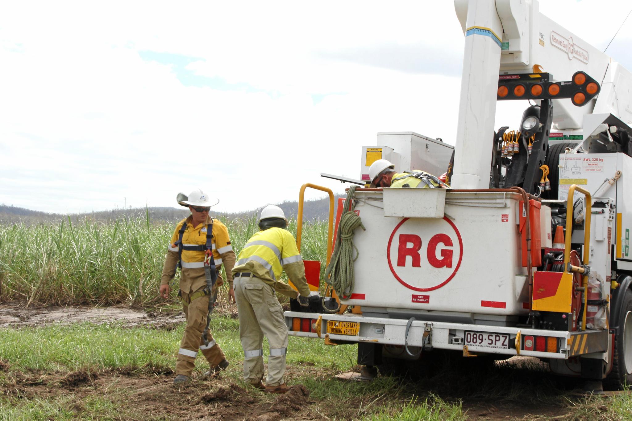 ergon-energy-hard-at-work-the-courier-mail