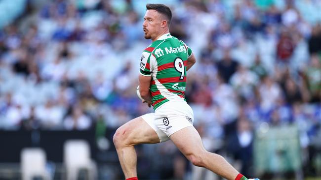 SYDNEY, AUSTRALIA - APRIL 02: Damien Cook of the Rabbitohs makes a break during the round four NRL match between the Canterbury Bulldogs and the South Sydney Rabbitohs at Stadium Australia, on April 02, 2021, in Sydney, Australia. (Photo by Cameron Spencer/Getty Images)