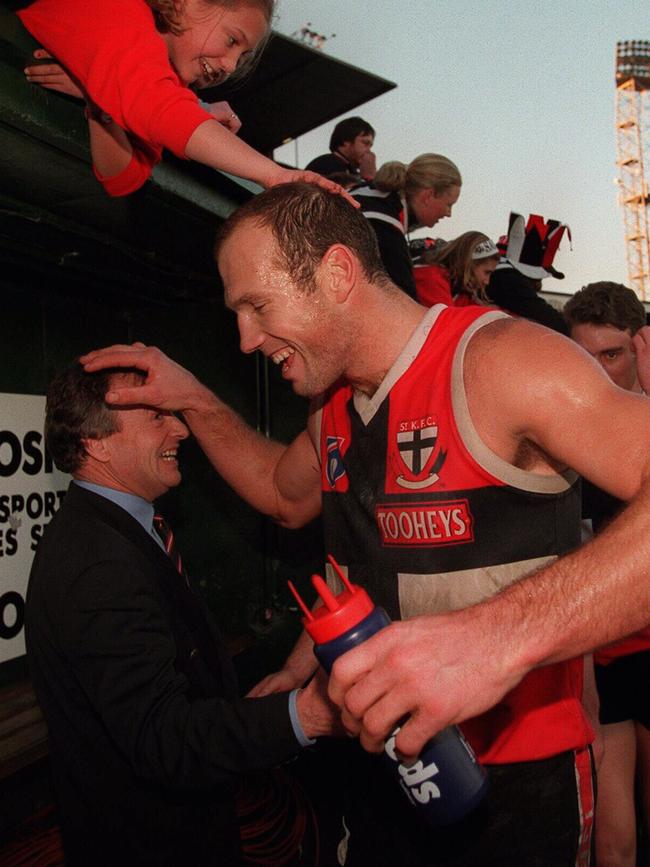 Along with star forward Stewart Loewe, pictured here with former president Andrew Plympton.