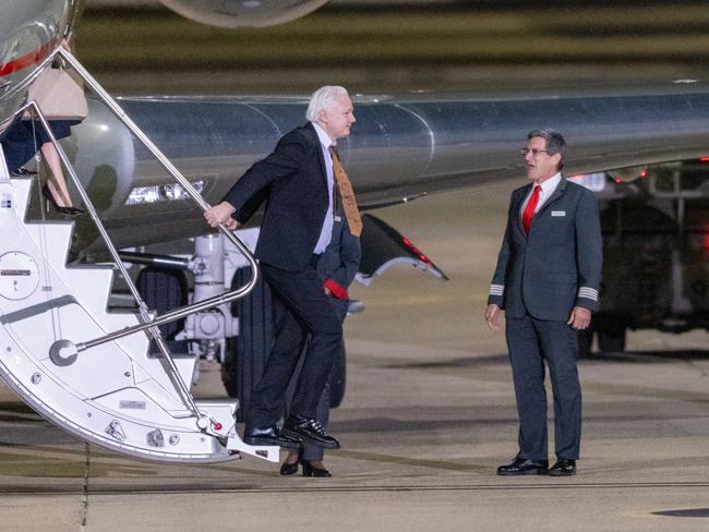 Julian Assange stepping off the plane. Picture: NewsWire / Ben Appleton