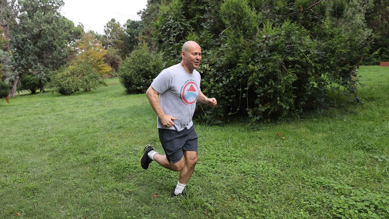 Budget day is not complete without a photo of a politician going for a run. Federal Treasurer Josh Frydenberg taking his morning exercise today. Picture: NCA NewsWire/Gary Ramage