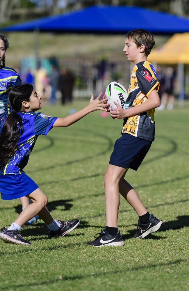 Dijle Murad of Glenvale State School and Bodhi Martin of Rockville State School in the inaugural Primary Interschools Reconciliation Touch Carnival hosted by Glenvale State School, Wednesday, May 28, 2025. Picture: Kevin Farmer