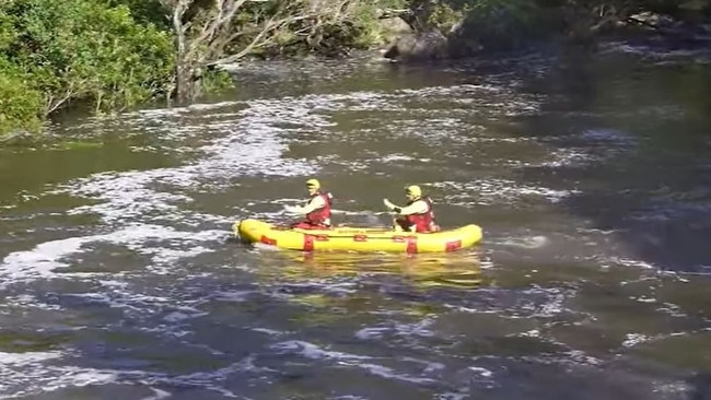 Swiftwater fire crews in the water at Wappa Falls. Picture: 9News