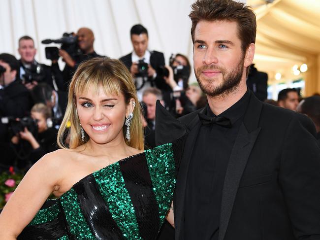 Miley Cyrus and Liam Hemsworth seemed happy in May. Picture: Getty