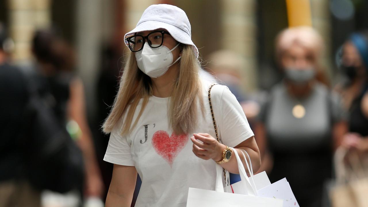 Australians are being urged to wear masks in public indoor spaces to help reduce the spread of Covid. Picture: Jason McCawley/Getty Images