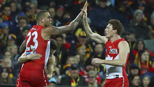 Lance Franklin celebrates a goal with Gary Rohan. Picture: Sarah Reed