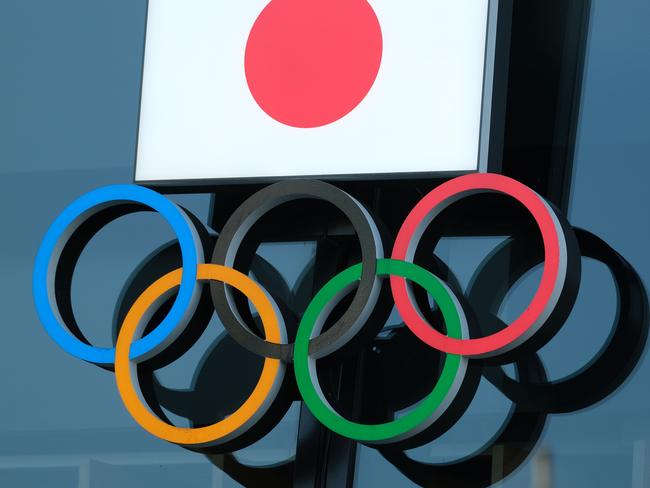 (FILES) In this file photo taken on November 15, 2020 the logo of the Japanese Olympic Committee is displayed at an entrance of the Japan Olympic Museum in Tokyo. - Florida's chief financial officer on January 25, 2021 told the International Olympic Committee that the state would be happy to host the Olympics Games amid speculation that current hosts Japan may back out. (Photo by Kazuhiro NOGI / AFP)