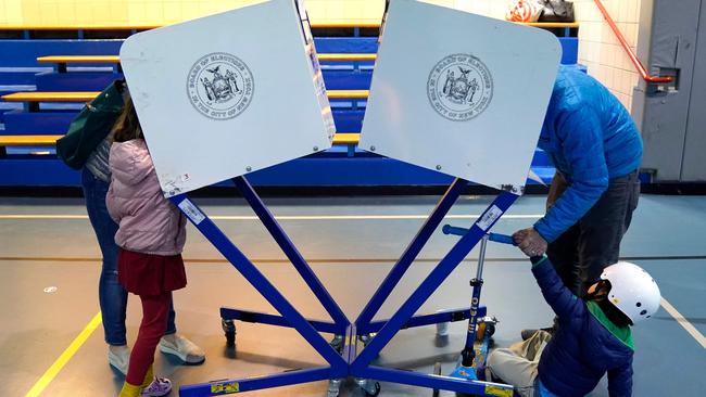 Voters cast ballots in the US midterm elections in New York. Picture: AFP