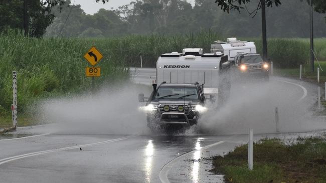 The Gairloch section of the Bruce Highway between Ingham and the Cardwell ranges, is currently underwater. Photograph: Cameron Bates