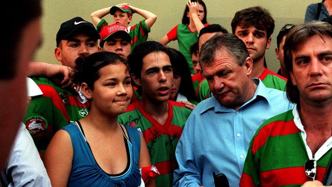 Former Souths president George Piggins with supporters after the bad news in 1999. Photo: Phil Hillyard.