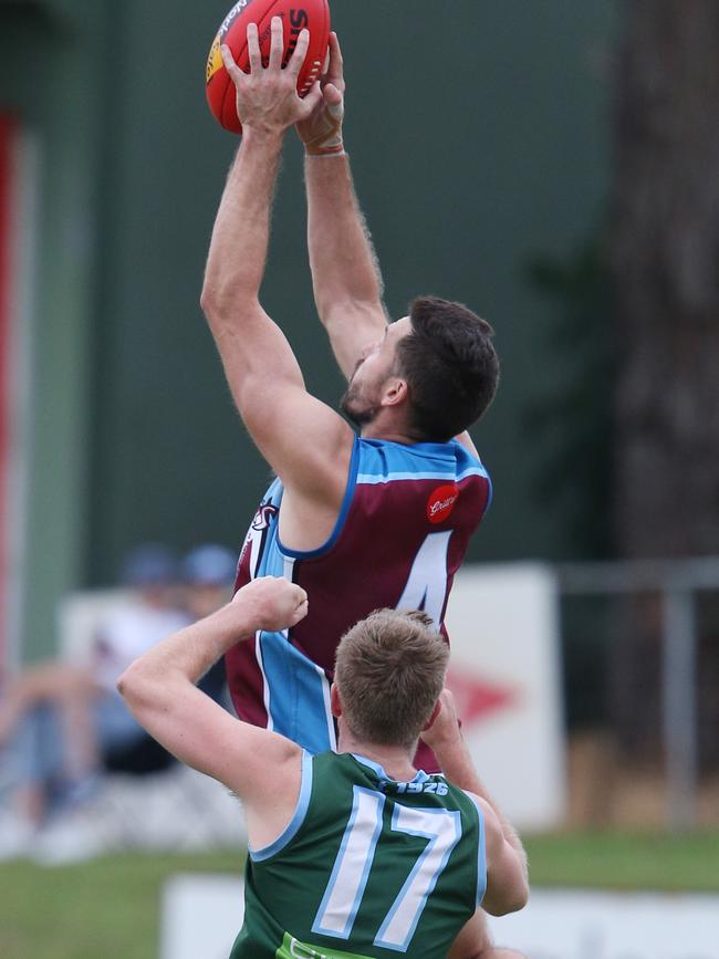 Aaron Black marks over Geelong Amateur’s Jack Scarlett in 2022. Picture: Mark Wilson