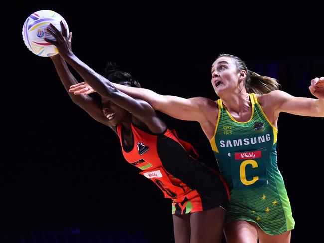 LIVERPOOL, ENGLAND - JULY 16:  Takondwa Lwazi of Malawi and Liz Watson of Australia in action during the preliminaries stage two schedule match between Australia and Malawi at M&S Bank Arena on July 16, 2019 in Liverpool, England. (Photo by Nathan Stirk/Getty Images)