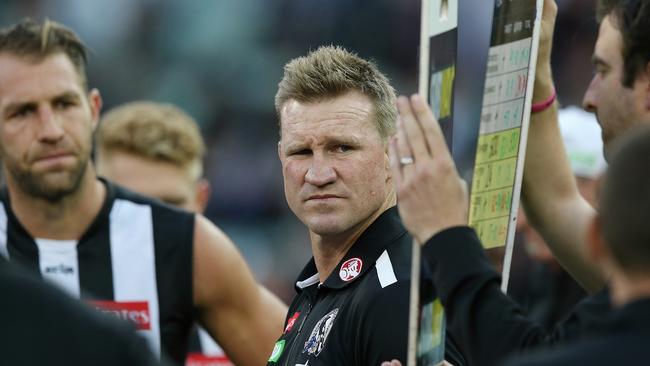 Nathan Buckley talks to his players at three-quarter time. Picture: Wayne Ludbey