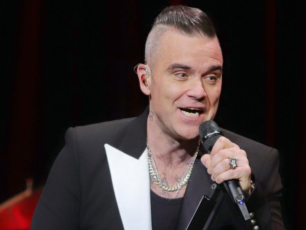 Robbie Williams apologised to Harmer by sending her a bouquet of flowers. Picture: Tristar Media/Getty Images