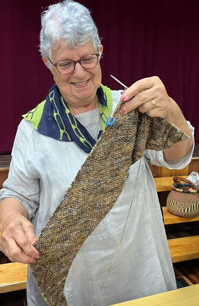 Valley Spinners &amp; Craft Group president Margaret Borg works on a knitted shawl at a meeting. Picture: Contributed